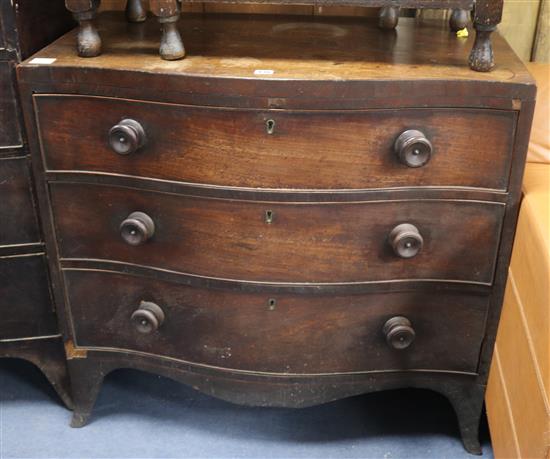 A George III mahogany serpentine chest W.91cm